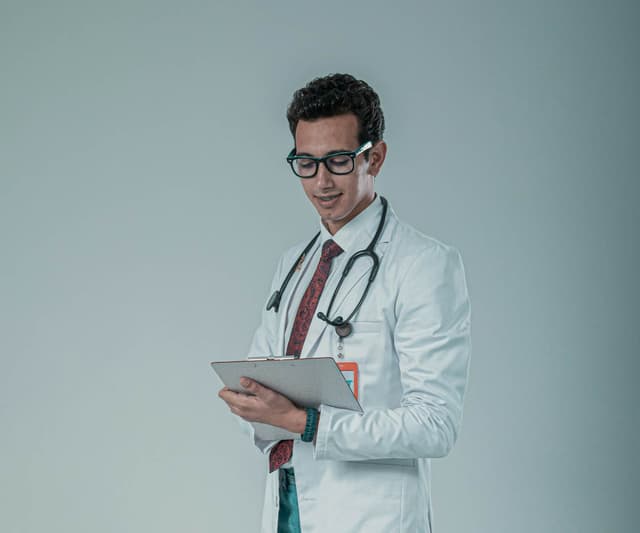 doctor holding notes